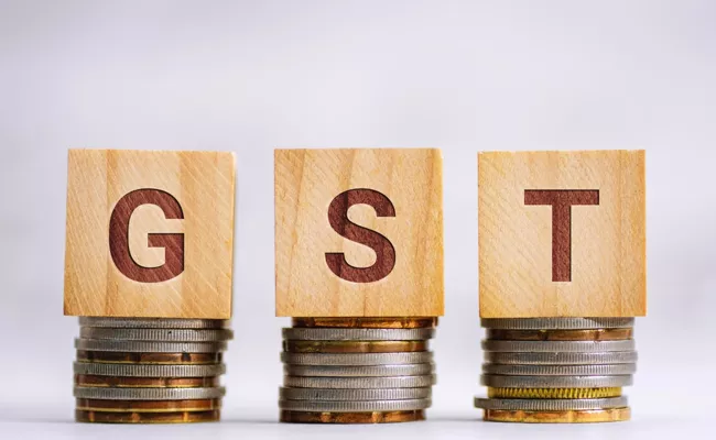 Traders Will Not Exemption Gst On Essential Goods Selling Items - Sakshi