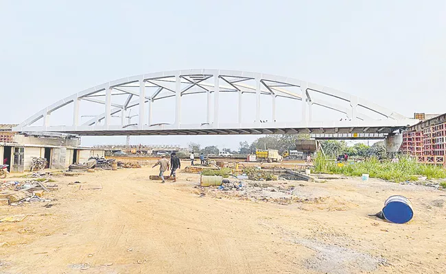 Bow String Girder Railway Bridge On Rajiv Road - Sakshi