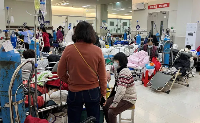 China: 70 Persent Population of Shanghai Infected Covid Claims Expert - Sakshi