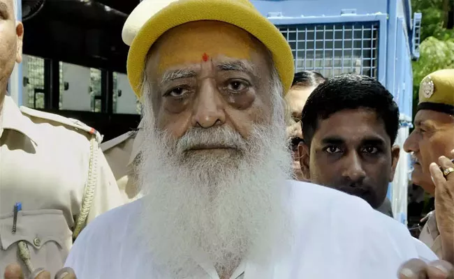 Gujarat Court Sentences Asaram To Life Imprisonment In 2013 Molestation Case - Sakshi