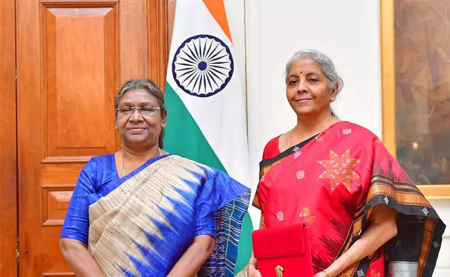 Union Budget 2023: Fm Nirmala Sitharaman Dons Bright Red Saree With Temple Border - Sakshi