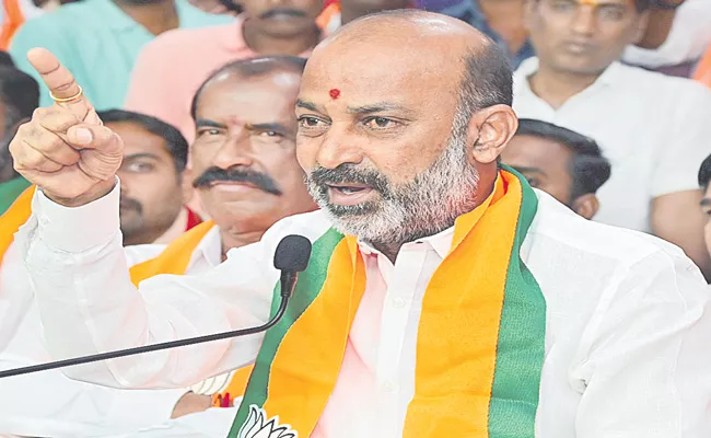 BJP Chief Bandi Sanjay Slams CM KCR Over Podu Lands Issues - Sakshi