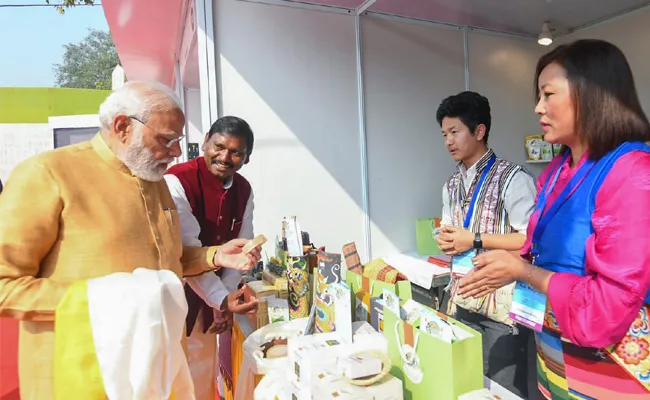 New Delhi: Narendra Modi Inaugurates Aadi Mahotsav At Major Dhyan Chand National Stadium - Sakshi