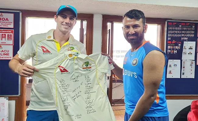 Australia Captain Pat Cummins Gifts Team Jersy To Cheteshwar Pujara - Sakshi