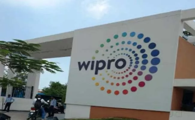 Wipro Half package IT employee union NITES files complaint Labour Ministry - Sakshi