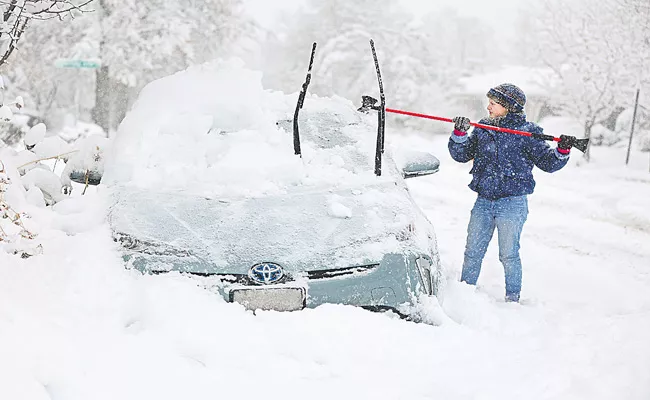 Winter Storm Pounds US With Ice Snow And Power Outages - Sakshi