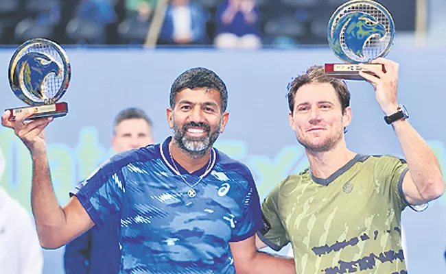 Rohan Bopanna and Mathew Ebden have won the doubles - Sakshi