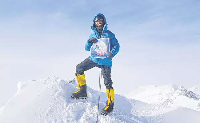 Navaratnalu Scheme flag on top of Vinson Massif - Sakshi