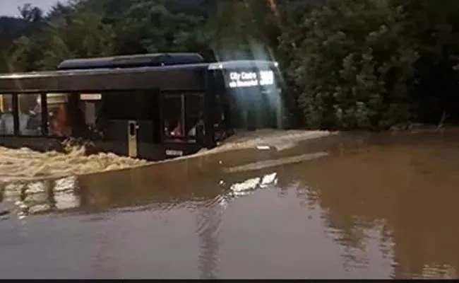 Viral Video: Bus Through Shoulder Deep Floodwaters In New Zealand - Sakshi