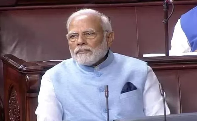 New Delhi: Pm Narendra Modi Wears A Special Blue Jacket In Parliament - Sakshi