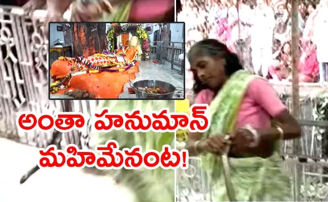 Woman Devotee Dance After Snake Wrap Her Hand Video Viral - Sakshi