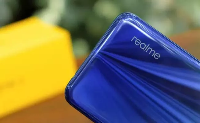 Realme to Soon Introduce Its First Foldable Phone Hints Official Teaser - Sakshi