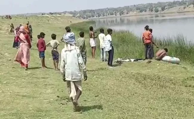 Crocodile Attack Devotees Crossing Chambal River In Madhya Pradesh - Sakshi