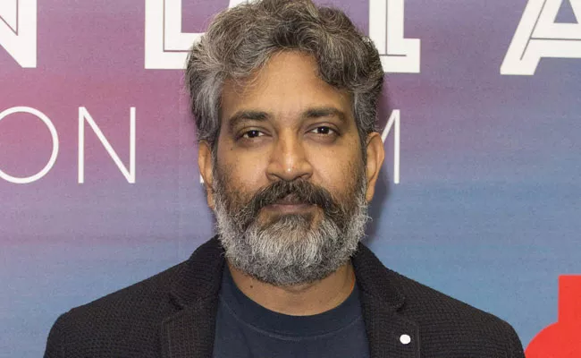 SS Rajamouli Response On Tesla Cars Light Show For Natu Natu Song - Sakshi