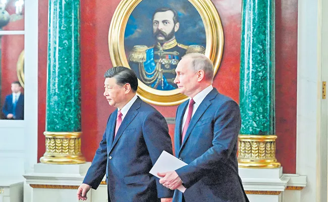 Chinese and Russian Presidents Confront Western Countries - Sakshi