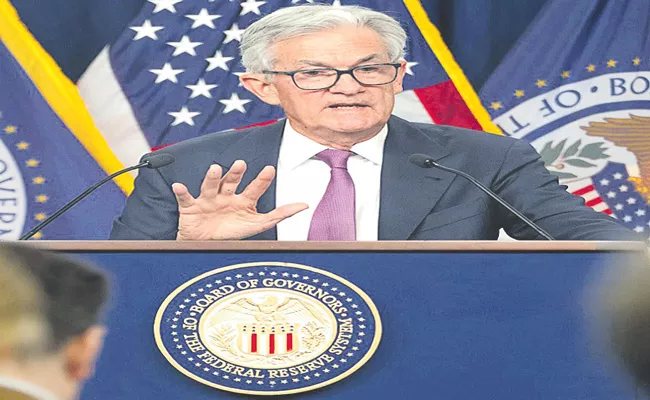 Fed delivers small rate hike amid global banking turmoil - Sakshi