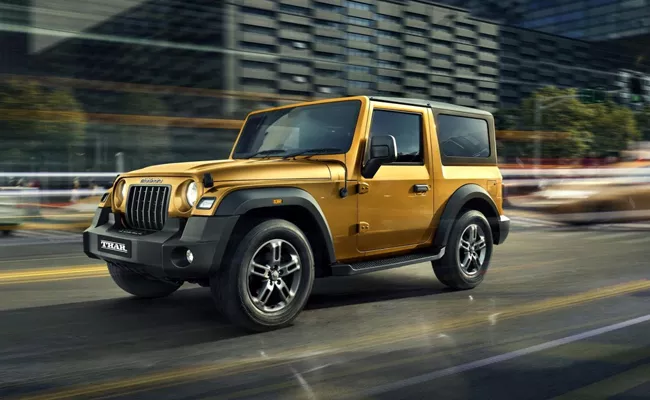 Mahindra thar rwd price hiked details - Sakshi