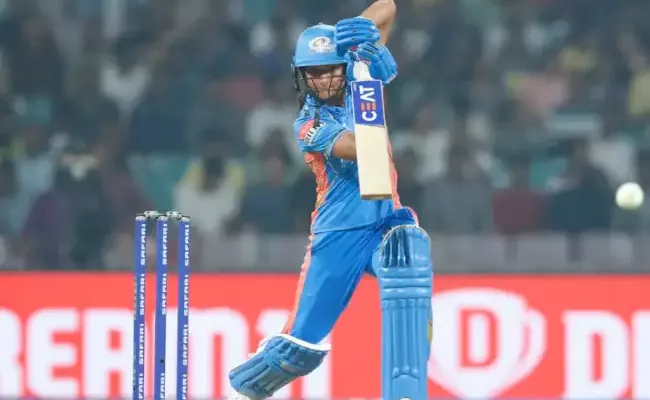 Mumbai Indians crush Gujarat Giants in WPL opener - Sakshi