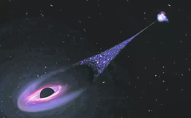 A giant black hole at the center of a galaxy - Sakshi