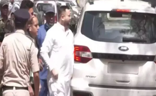 Bihar Dy CM Tejashwi Yadav Appears Before ED Job For Land Scam - Sakshi