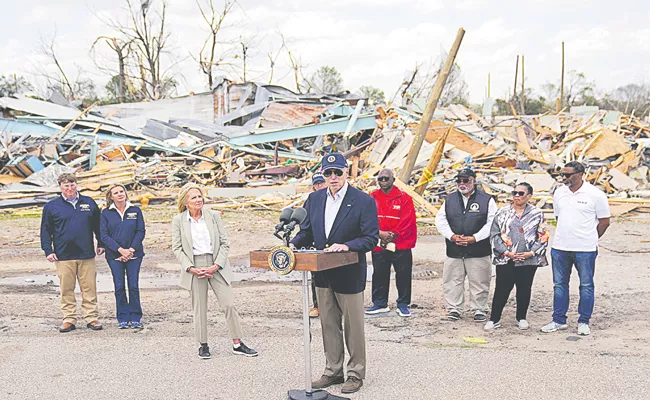 Tornadoes spawned by huge system pulverize homes at USA - Sakshi