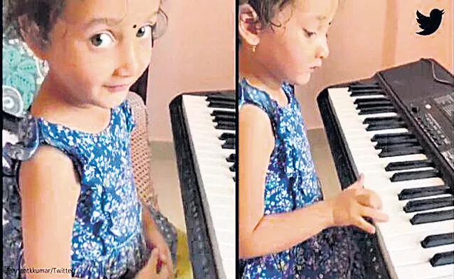 Clip Of Little Girl Singing Kannada Track While Playing - Sakshi