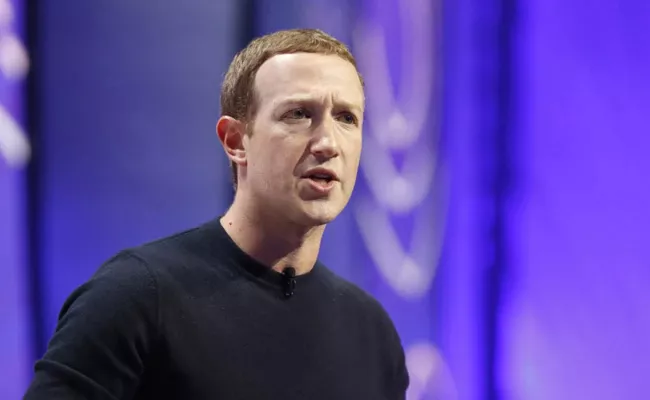 Meta employees question CEO Mark Zuckerberg for paying bonuses during wide layoffs - Sakshi