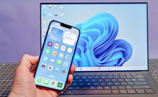 iPhone users can now connect phone to windows PCs with new Microsoft app - Sakshi