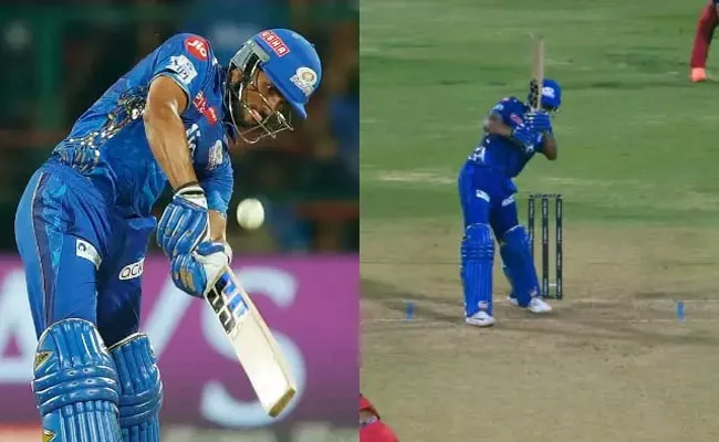 Tilak Varma Helicopter Shot Goes Viral Vs RCB - Sakshi