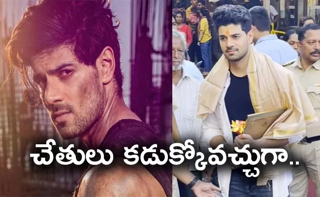 Sooraj Pancholi Trolled for Holding Lord Ganesha Poster After Touching Shoes - Sakshi