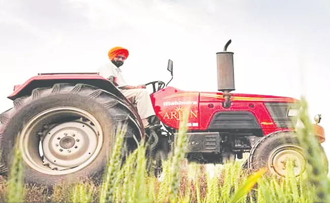 Mahindra to bring 40 tractor models under new OJA brand - Sakshi