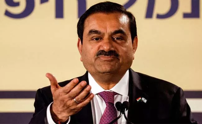 Gautam Adani Group Said It Will Prepay Usd 130 Million Of Debt  - Sakshi