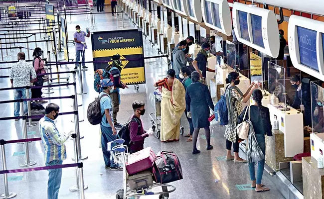 Bengaluru Airport: Youth Extortion From Passengers Got Arrested - Sakshi