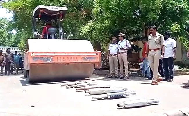 Karimnagar Police trampled Bike Silencers with Road Roller - Sakshi