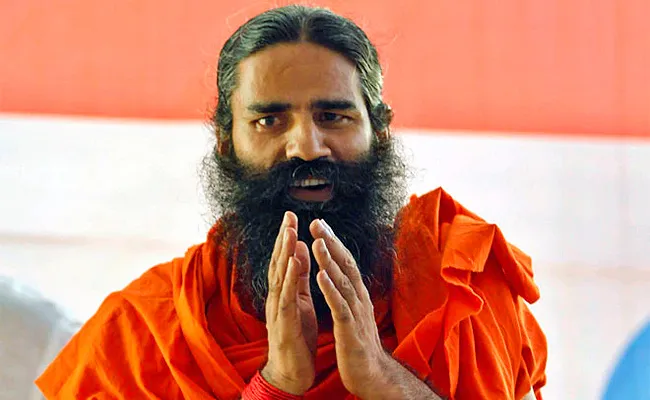 Baba Ramdev advice on population control - Sakshi