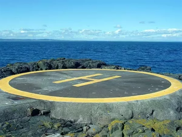 h written inside the circle on the helipad - Sakshi