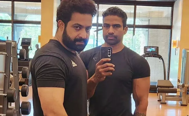 Jr NTR begins prep for Devara in gym Workout sessions on vacation - Sakshi