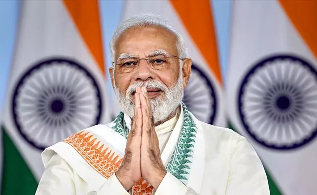 PM Modi Congratulated Telangana People On State Farmation Day - Sakshi