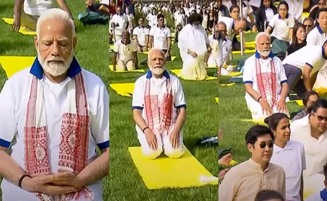 PM Modi Yoga Event At UN HQ Sets Guinness World Record - Sakshi