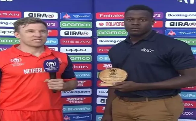 CWC Qualifiers 2023: Brathwaite Expressions While Presenting POTM Award To Logan Van Beek - Sakshi