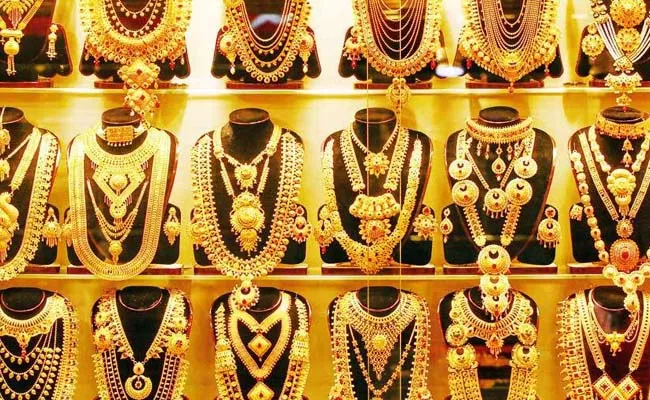 Gold price coming down On Stronger Dollar Check details - Sakshi