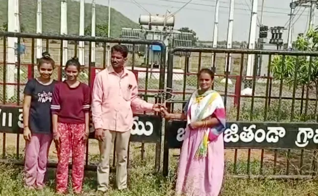 Khammam Man Protest Locked Sub Station Over Job Assurance - Sakshi