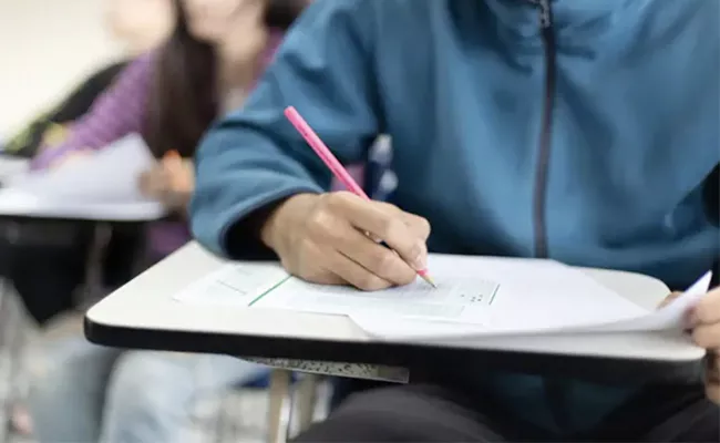 Candidate Of Group4 Exam Caught Writing With Cellphone - Sakshi