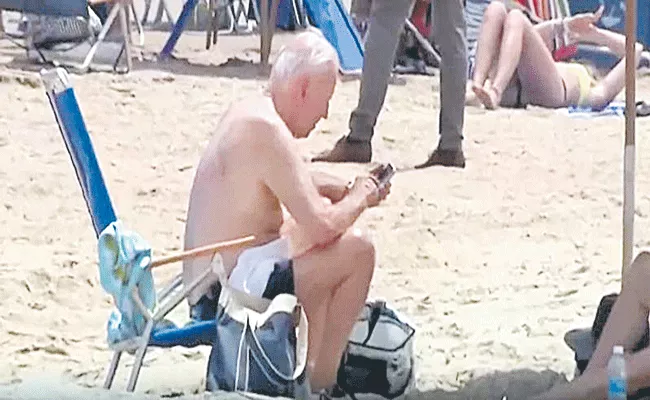 US President Joe Biden Relaxes At The Beach During His Latest Vacation In Delaware - Sakshi