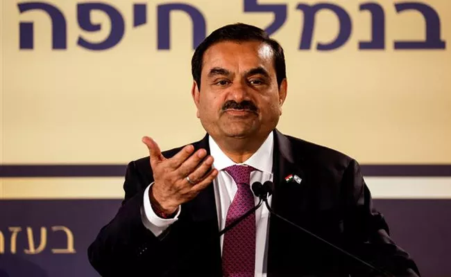 Adani Raises 1.4 Billion From Stake Sale In 3 Companies,9 Billion Raised In 4 Years - Sakshi