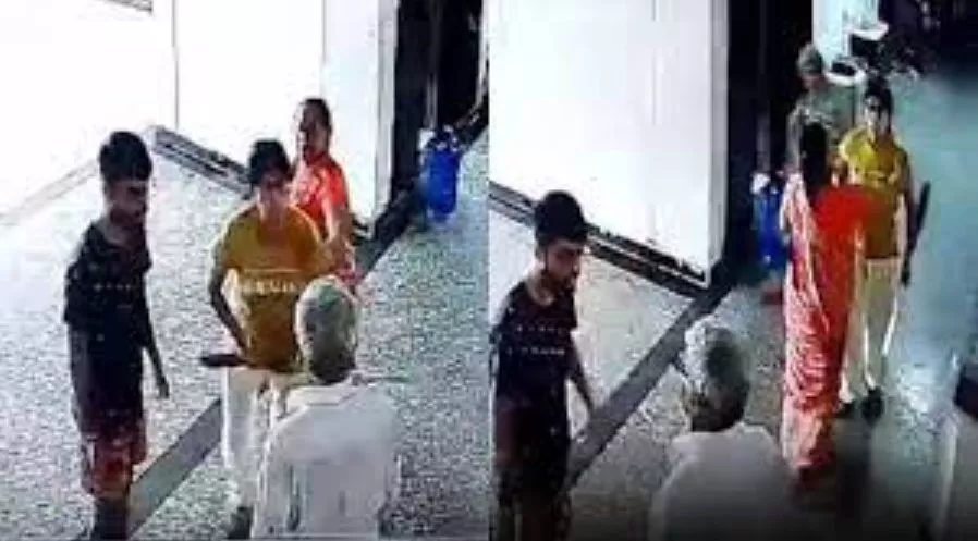 Woman Thrashes Watchman With Broom After Lift Stops Working - Sakshi