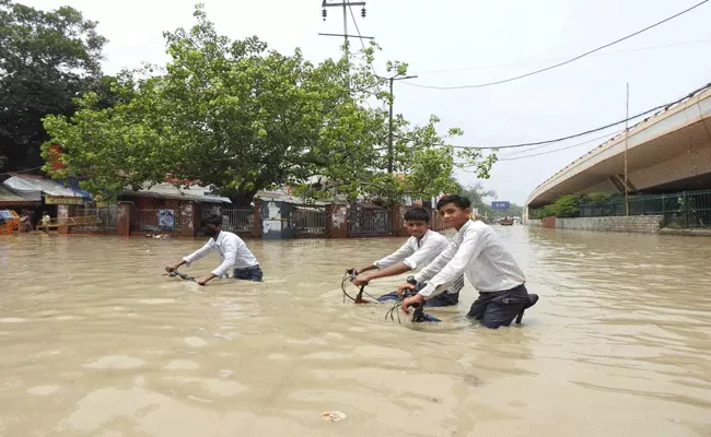 72 pc districts exposed to extreme floods - Sakshi