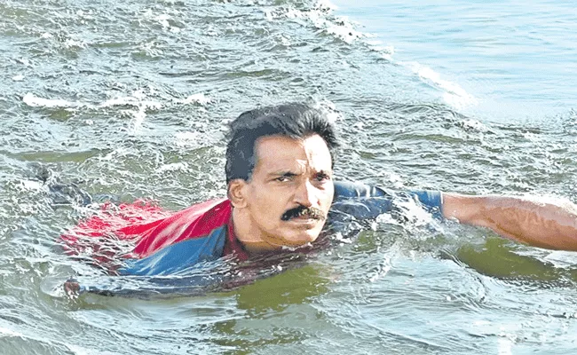 Kerala Man Saji Valasseril on mission to make Kerala swim for survival - Sakshi