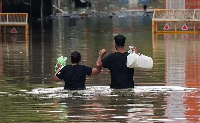 economic loss due to floods estimated upto rs 15000 crore sbi ecowrap report - Sakshi