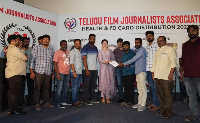 Rashmika Mandanna Handed Over ID, Health Cards To Telugu Film Journalist Association Members - Sakshi